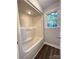 Clean, bright bathroom showcasing a modern shower and window providing natural light at 1335 33Rd Avenue Ne Dr, Hickory, NC 28601