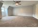 Expansive bedroom featuring neutral carpet and ceiling fan at 1335 33Rd Avenue Ne Dr, Hickory, NC 28601