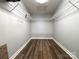 Walk-in closet with installed shelving and wood floor at 1335 33Rd Avenue Ne Dr, Hickory, NC 28601