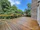 Spacious wooden deck featuring sturdy black railings and providing ample outdoor entertaining space at 1335 33Rd Avenue Ne Dr, Hickory, NC 28601