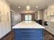 Spacious kitchen with a large island, custom cabinetry, and granite countertops, perfect for entertaining at 1335 33Rd Avenue Ne Dr, Hickory, NC 28601
