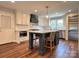 Modern kitchen with stainless steel appliances, white cabinets, and a central island with seating at 1335 33Rd Avenue Ne Dr, Hickory, NC 28601