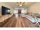 Spacious living room with hardwood floors, fireplace and ceiling fan at 1335 33Rd Avenue Ne Dr, Hickory, NC 28601