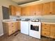 Laundry room featuring matching washer and dryer, ample cabinets, and countertop space at 147 Dutchman Rd, Harmony, NC 28634