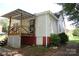 Rear view of the house featuring a wooden deck and backyard at 1541 Kings Rd, Shelby, NC 28150