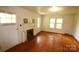 Bright living room with hardwood floors, fireplace, and natural light at 1541 Kings Rd, Shelby, NC 28150