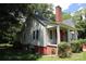 A side view of the home highlighting the windows and yard at 1541 Kings Rd, Shelby, NC 28150
