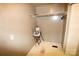 Small storage room featuring a shelf and hanging rod and room for a clothes hamper at 1541 Kings Rd, Shelby, NC 28150