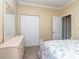 Cozy bedroom features a comfortable bed with starfish patterned bedding and ample closet space at 15739 Circlegreen Dr, Charlotte, NC 28273