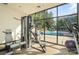 Well-equipped fitness center with views of the community pool at 207 N Dotger Ave # C14, Charlotte, NC 28207
