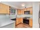 Well-equipped kitchen with stainless steel appliances, updated cabinetry, and modern countertops at 207 N Dotger Ave # C14, Charlotte, NC 28207