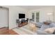 Comfortable living room features a cozy seating area, and lots of natural light at 207 N Dotger Ave # C14, Charlotte, NC 28207
