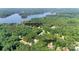 Stunning aerial view of 260 River Country Rd with lake access and community boat ramp at 260 River Country Rd, Salisbury, NC 28146