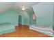 Bedroom with hardwood floors, bright light, and large doorway leading to a hallway at 260 River Country Rd, Salisbury, NC 28146