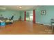 Bright bonus room with sliding glass doors to backyard and ample space for activities at 260 River Country Rd, Salisbury, NC 28146