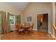 Cozy dining room with hardwood floors, ample natural light, and seating for six at 260 River Country Rd, Salisbury, NC 28146