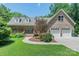 Charming brick home with a well-manicured lawn and an inviting covered porch at 260 River Country Rd, Salisbury, NC 28146