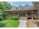 Inviting brick home with a spacious covered porch and charming curb appeal at 260 River Country Rd, Salisbury, NC 28146