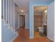 Entryway featuring stairs and doorway to a bathroom with brown shower curtain and sink at 260 River Country Rd, Salisbury, NC 28146