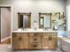 This bathroom features a double vanity, a large soaker tub, and built-in floating shelves for storage at 4023 Yesteryears Ln, Marshville, NC 28103
