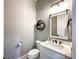 Charming powder room featuring modern fixtures, decor, and a stylish round shelf at 4023 Yesteryears Ln, Marshville, NC 28103