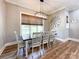 Charming dining room with large window, modern lighting, and stylish decor at 4023 Yesteryears Ln, Marshville, NC 28103
