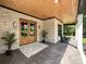 Inviting front porch with double doors, stylish brickwork, and cozy rocking chairs at 4023 Yesteryears Ln, Marshville, NC 28103