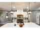 Well-lit kitchen with modern appliances, spacious island, and stylish pendant lighting at 4023 Yesteryears Ln, Marshville, NC 28103