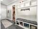 Well-organized mudroom with custom shelving, seating, and storage; stylish and functional space at 4023 Yesteryears Ln, Marshville, NC 28103