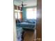 Bedroom with hardwood floors, blue walls and natural light at 410 Arthur Ave, Gastonia, NC 28052