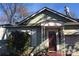 Charming home featuring a classic front porch with decorative ironwork and a craftsman-style entrance at 410 Arthur Ave, Gastonia, NC 28052
