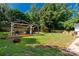 Spacious backyard featuring a gazebo, grill, and fire pit, perfect for outdoor gatherings at 4567 Hickory Grove Rd, Sharon, SC 29742