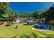 Large backyard with a gazebo, pool, and deck, ideal for outdoor enjoyment at 4567 Hickory Grove Rd, Sharon, SC 29742