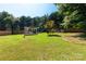 Well-maintained backyard featuring a gazebo and a covered hammock area at 4567 Hickory Grove Rd, Sharon, SC 29742