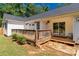 Back of house with deck and patio with lawn at 4567 Hickory Grove Rd, Sharon, SC 29742