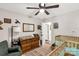 Bedroom with patterned rug, dresser, and a comfortable chair at 4567 Hickory Grove Rd, Sharon, SC 29742