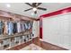 Charming closet featuring custom wood shelving and storage solutions perfect for organization and accessibility at 4567 Hickory Grove Rd, Sharon, SC 29742