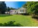 The exterior of this home features a charming porch and well-kept landscaping at 4567 Hickory Grove Rd, Sharon, SC 29742