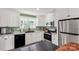 Well-equipped kitchen with modern appliances, granite countertops, and ample storage space, perfect for cooking at 4567 Hickory Grove Rd, Sharon, SC 29742