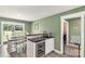 Bright kitchen with granite countertops and a bar area that connects to an outdoor dining space at 4567 Hickory Grove Rd, Sharon, SC 29742