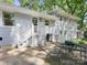 Backyard patio featuring outdoor seating, a grill, and access to the backyard at 4618 Emory Ln, Charlotte, NC 28211
