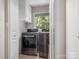 Convenient laundry room with new washer and dryer units and storage at 4618 Emory Ln, Charlotte, NC 28211