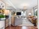 Elegant living room with hardwood floors, natural light, and sophisticated decor at 4618 Emory Ln, Charlotte, NC 28211