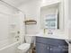 Bathroom with tub and shower combo and gray vanity at 5008 Calvine Mill Way, Charlotte, NC 28205