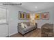 Cozy den with comfortable sofa and bar decor at 5213 Crimson Kate Ln # 2007B, Charlotte, NC 28208