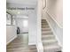 Hallway with stairs and visible entrance to other rooms at 5213 Crimson Kate Ln # 2007B, Charlotte, NC 28208