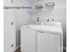 Laundry room with side by side washer and dryer at 5213 Crimson Kate Ln # 2007B, Charlotte, NC 28208