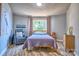 Relaxing bedroom with lake-themed decor, featuring views of the surrounding natural environment at 5390 Hudson Rd, Clover, SC 29710