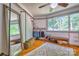 Bright bedroom featuring hardwood floors, a walk-in closet, and lots of natural light at 5390 Hudson Rd, Clover, SC 29710