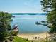 Beautiful lake view with a private sandy beach, dock, and covered boat slip at 5390 Hudson Rd, Clover, SC 29710